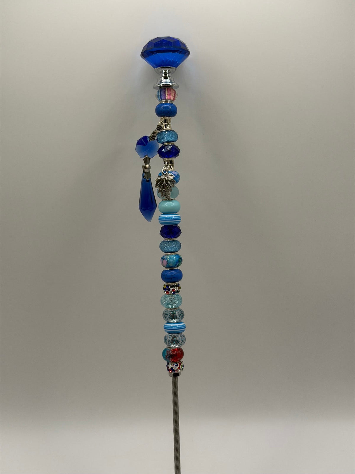 Handmade blue beaded garden wand stake with jewel topper and leaf charm