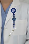Royal blue flower beaded badge reel lanyard with metallic blue flower focal bead