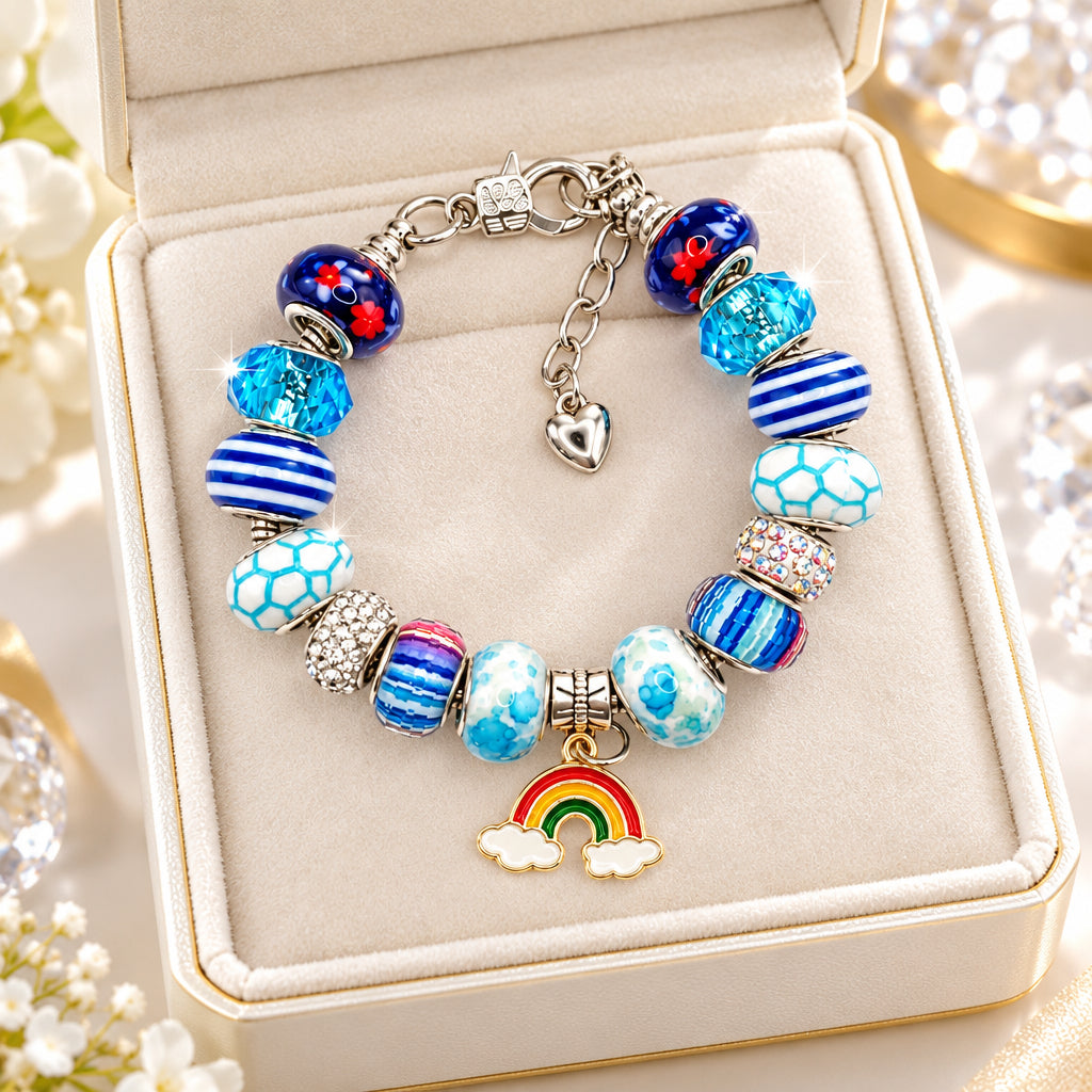 Blue Pandora-style bracelet with rainbow and cloud charm