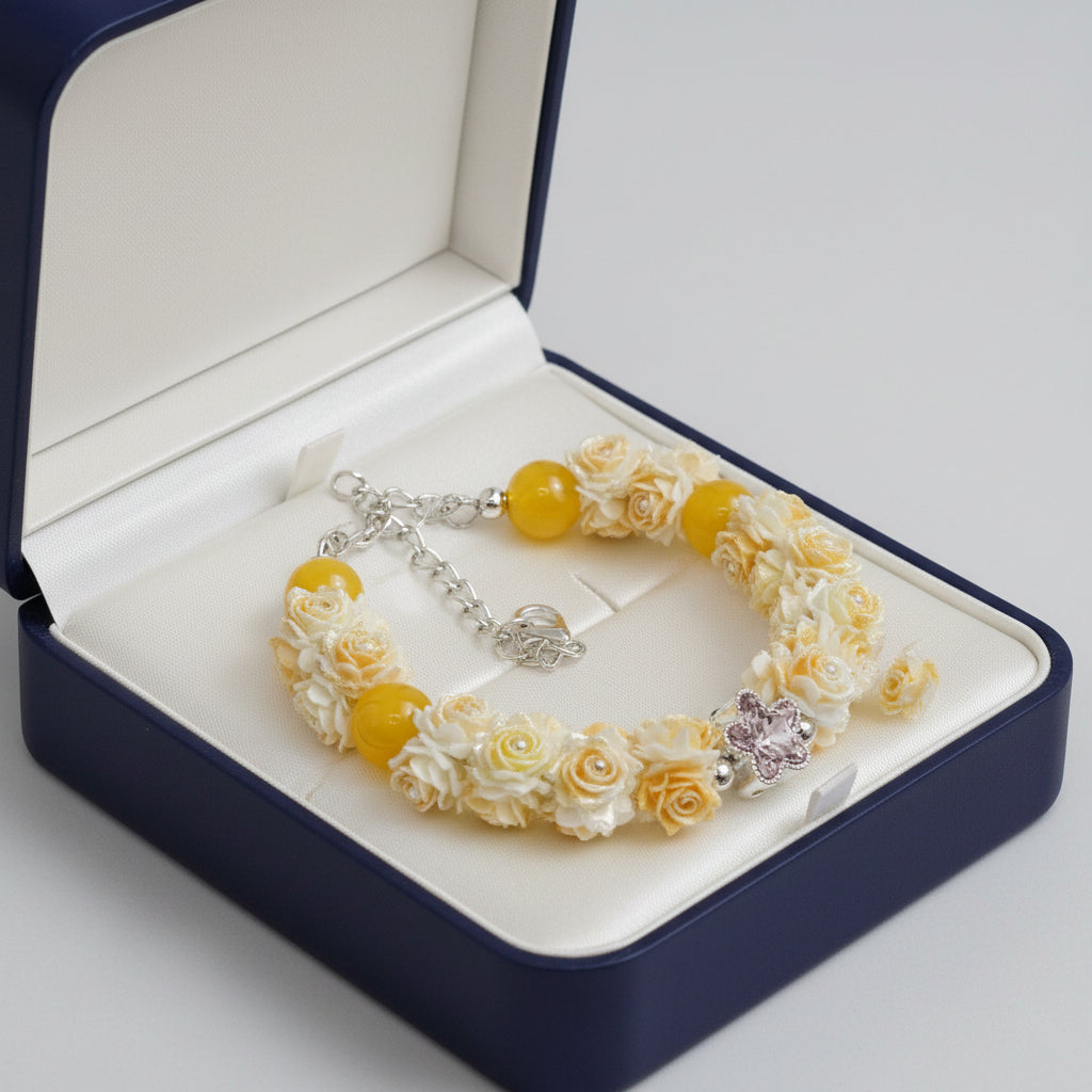 Cream rose bouquet bracelet with yellow beads and crystal flower centerpiece