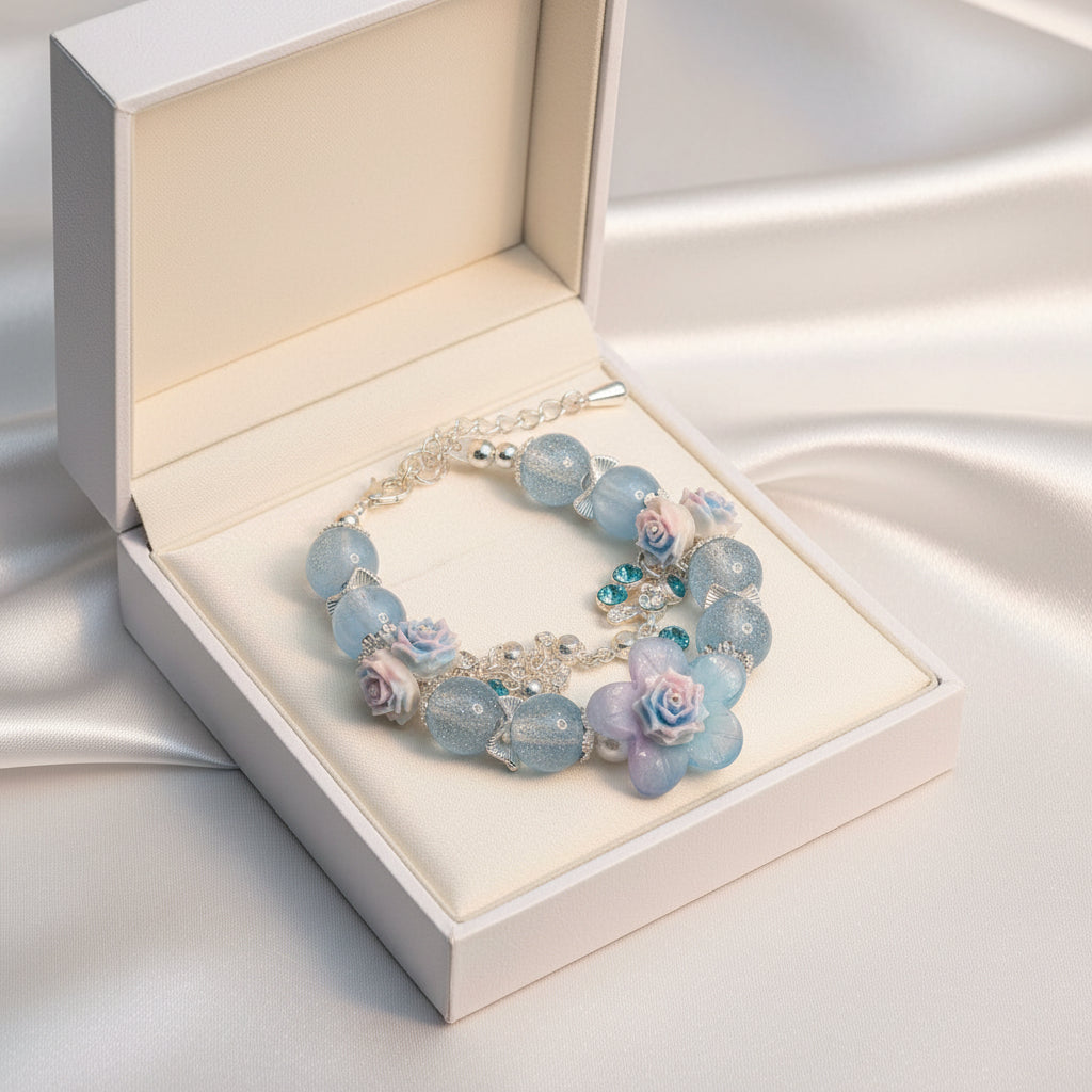Blue rose peacock charm bracelet with aqua crystal accents