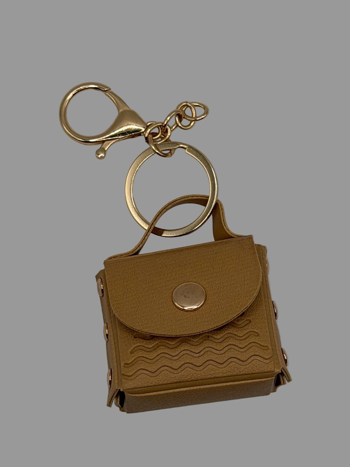 Tan Embossed Wave Mini Purse Keychain