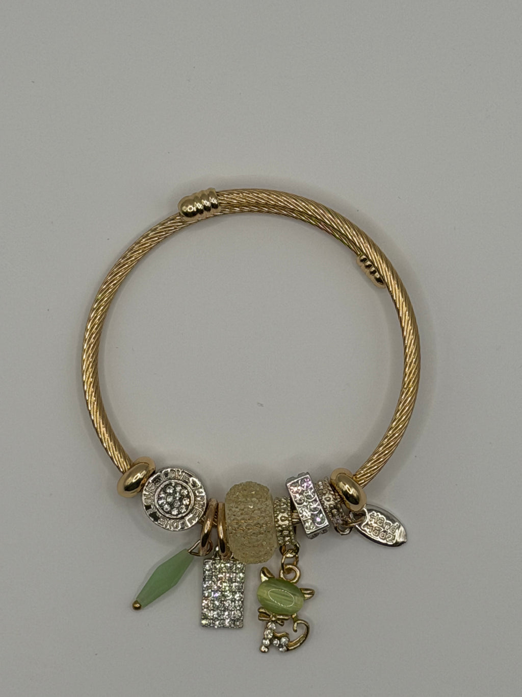 Gold Charm Bangle Bracelet with Green Charms