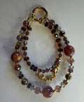 Brown marble and crystal double-strand phone wristlet with gold star beads and ring clasp