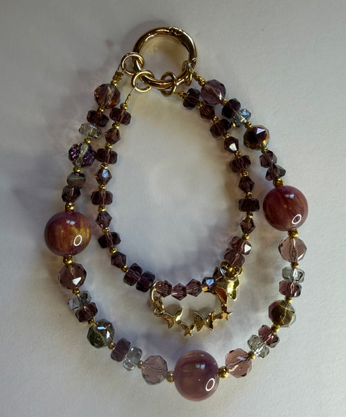 Brown marble and crystal double-strand phone wristlet with gold star beads and ring clasp