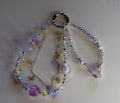 Purple butterfly crystal multi-strand phone wristlet with gold butterfly charms and silver ring clasp