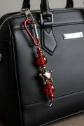 Goth Hello Kitty star beaded keychain with dark burgundy glitter beads and red carabiner