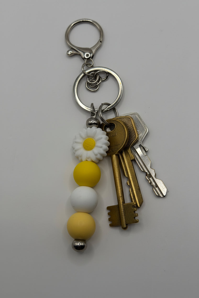 White daisy yellow and white silicone beaded keychain with silver hardware
