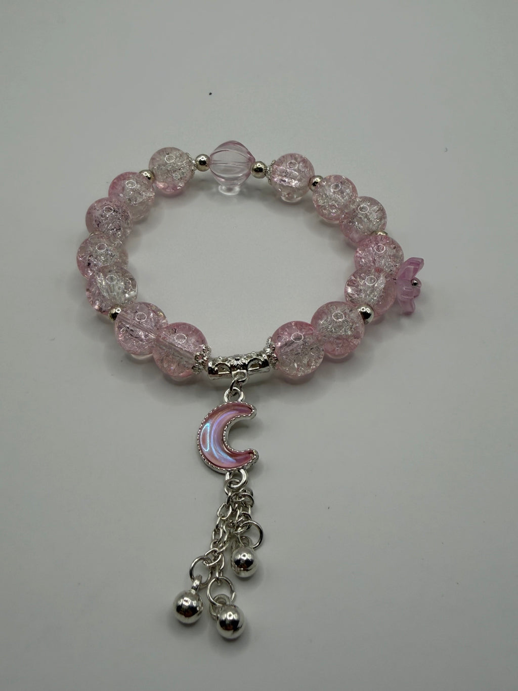 Pink Crackle Glass Stretch Bracelet with Moon & Bell Charms