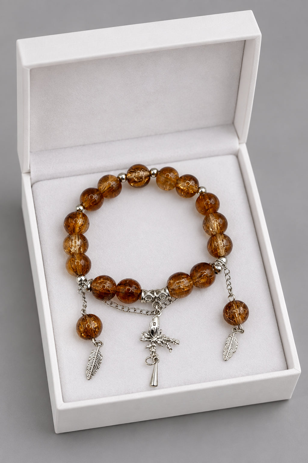 Smoky Brown Stretch Bracelet with Fairy, Feather & Bead Charms