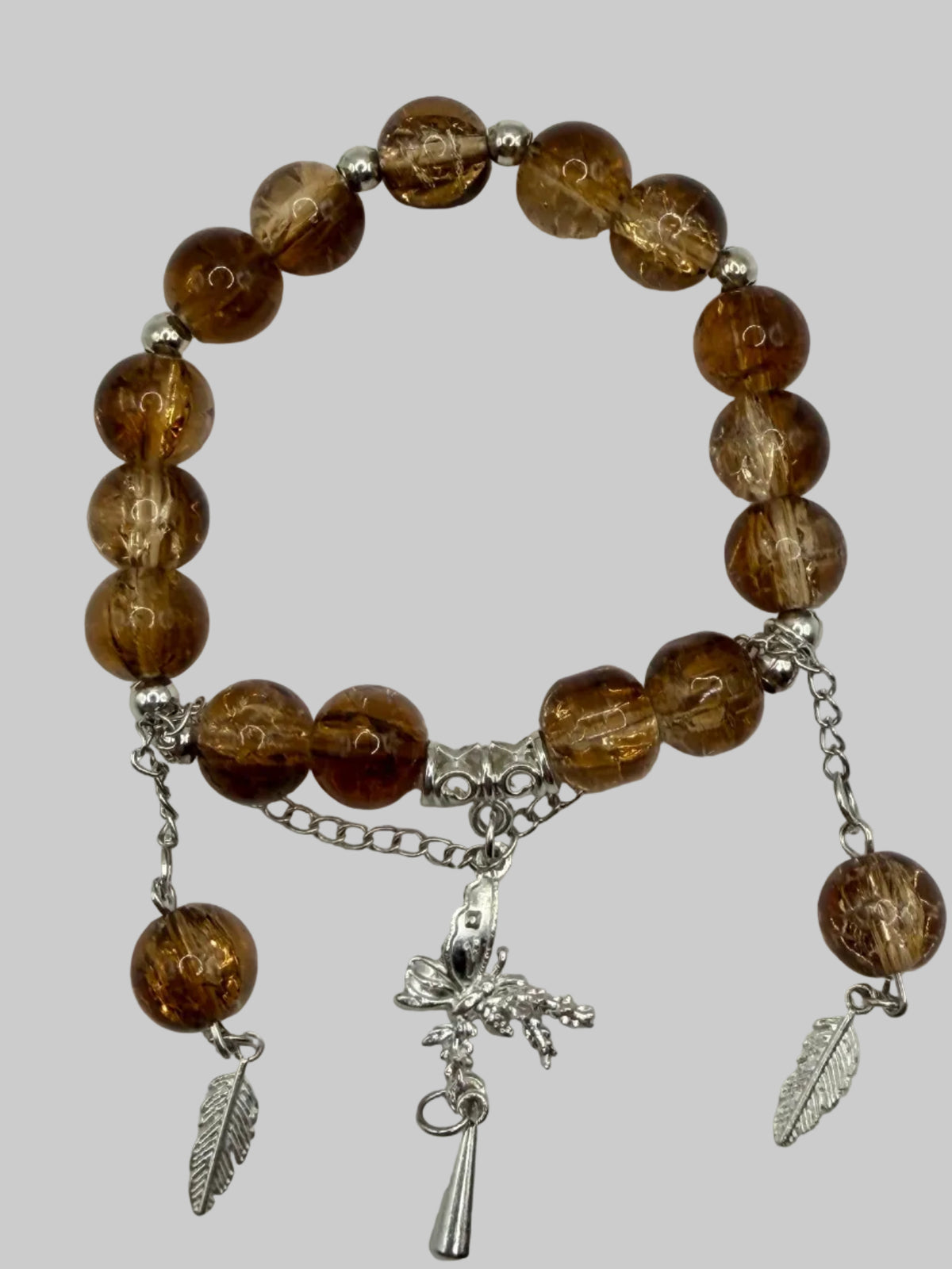 Smoky Brown Stretch Bracelet with Fairy, Feather & Bead Charms