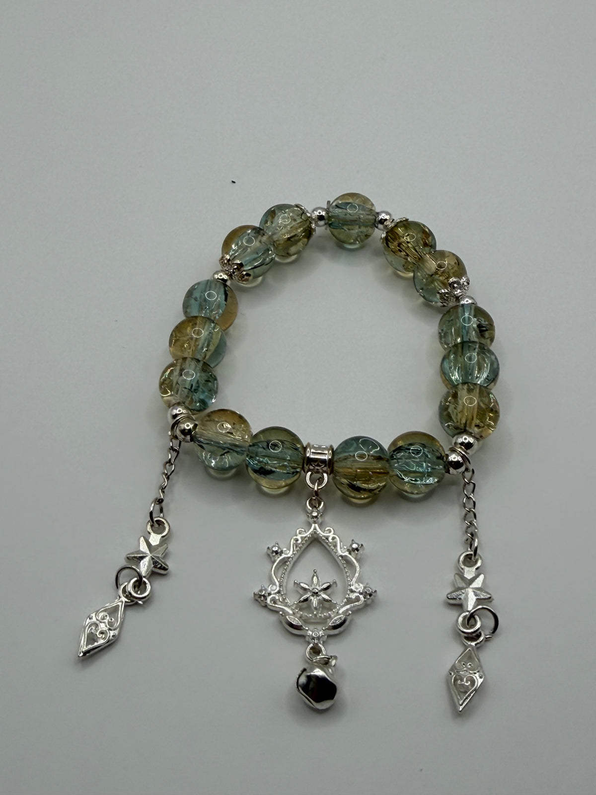 Green Brown Crackle Glass Stretch Bracelet with Star Medallion & Butterfly Charms