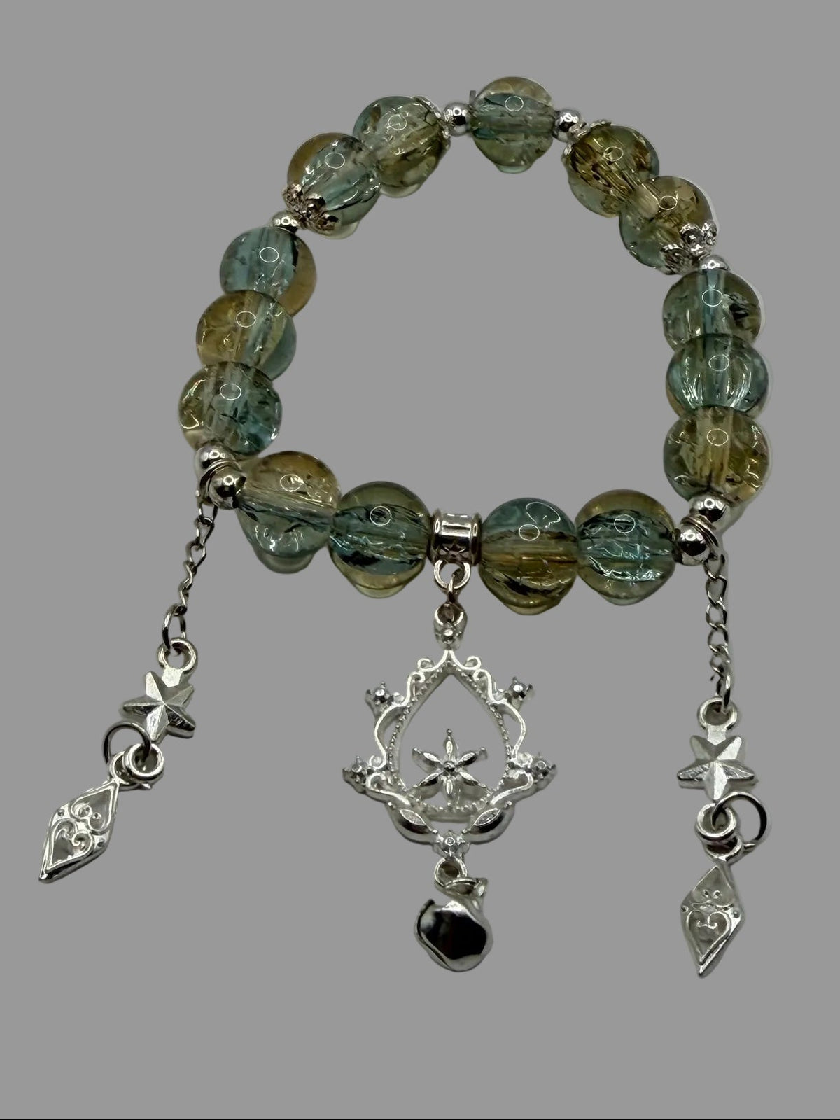 Green Brown Crackle Glass Stretch Bracelet with Star Medallion & Butterfly Charms