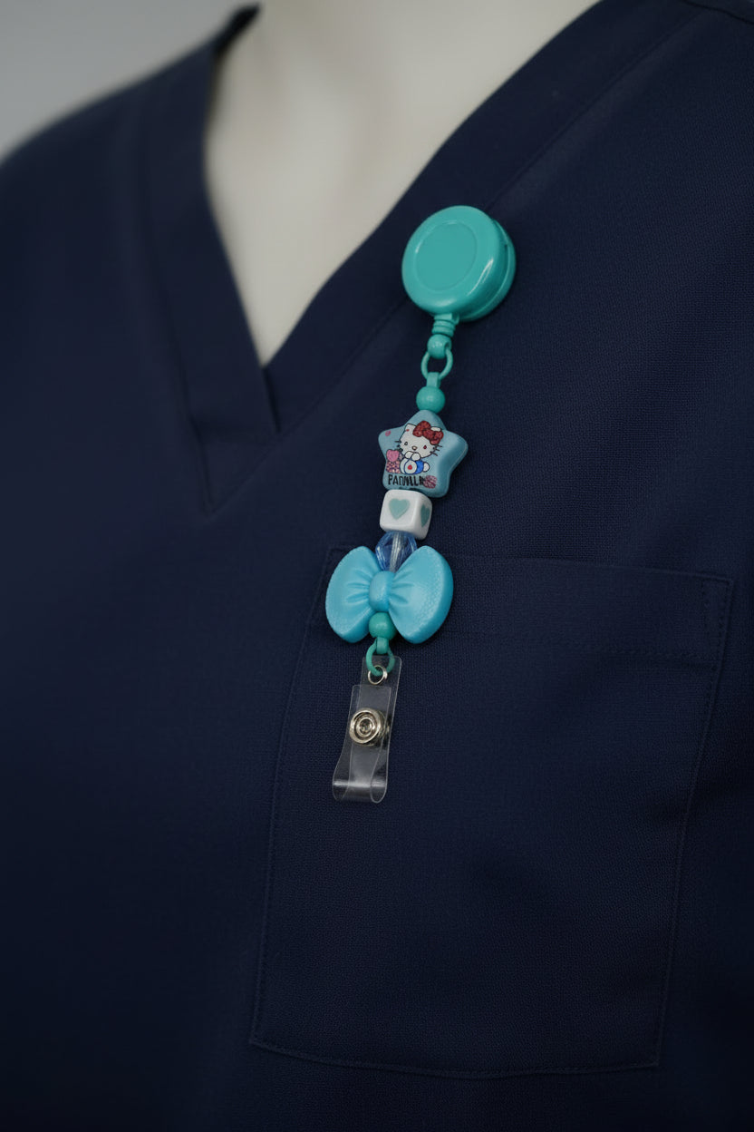 Teal Hello Kitty bow beaded badge reel lanyard with silver heart cube bead