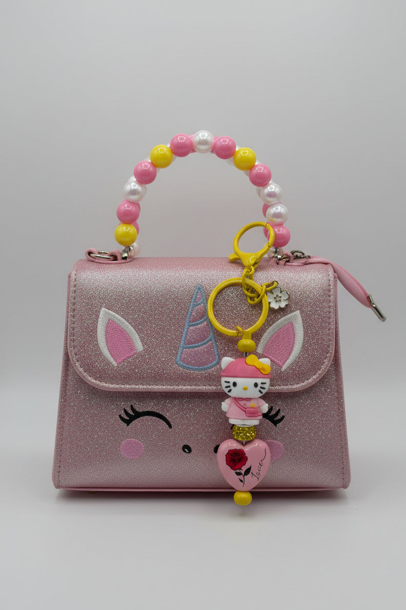 Pink Hello Kitty Love Heart Beaded Keychain with yellow hardware and silver flower charm