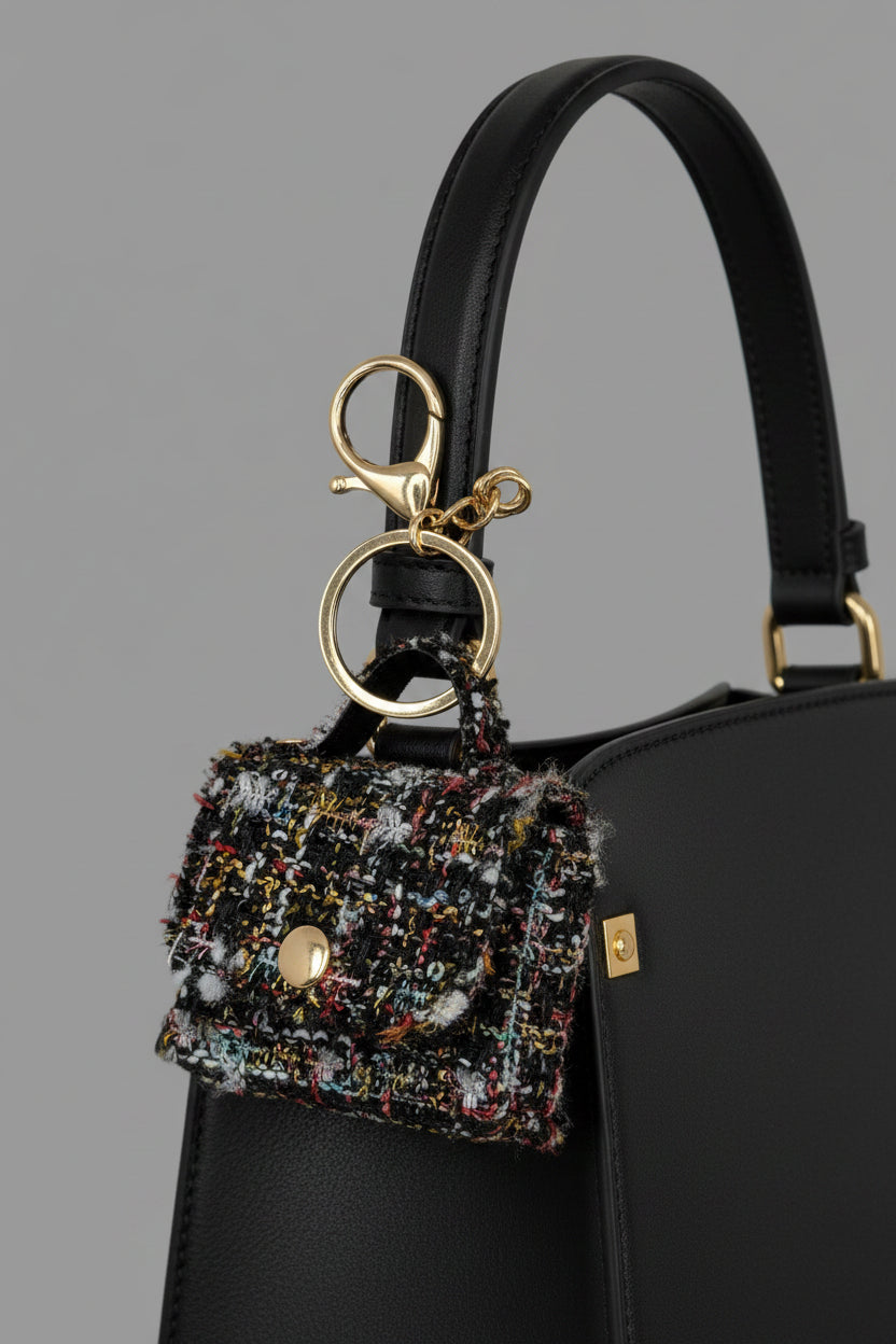 Black multicolor tweed mini purse keychain with gold-tone hardware