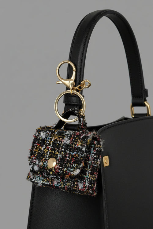 Black multicolor tweed mini purse keychain with gold-tone hardware