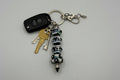 Black and white panda print beaded pen keychain with iridescent shimmer beads and silver spike tip