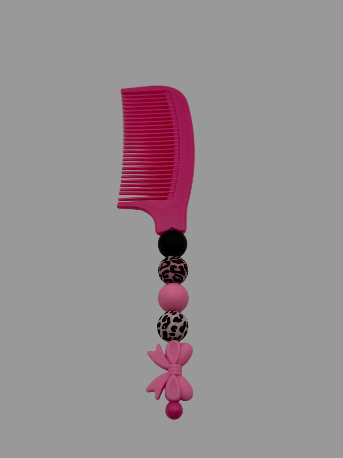 Hot pink leopard beaded comb with bow charm