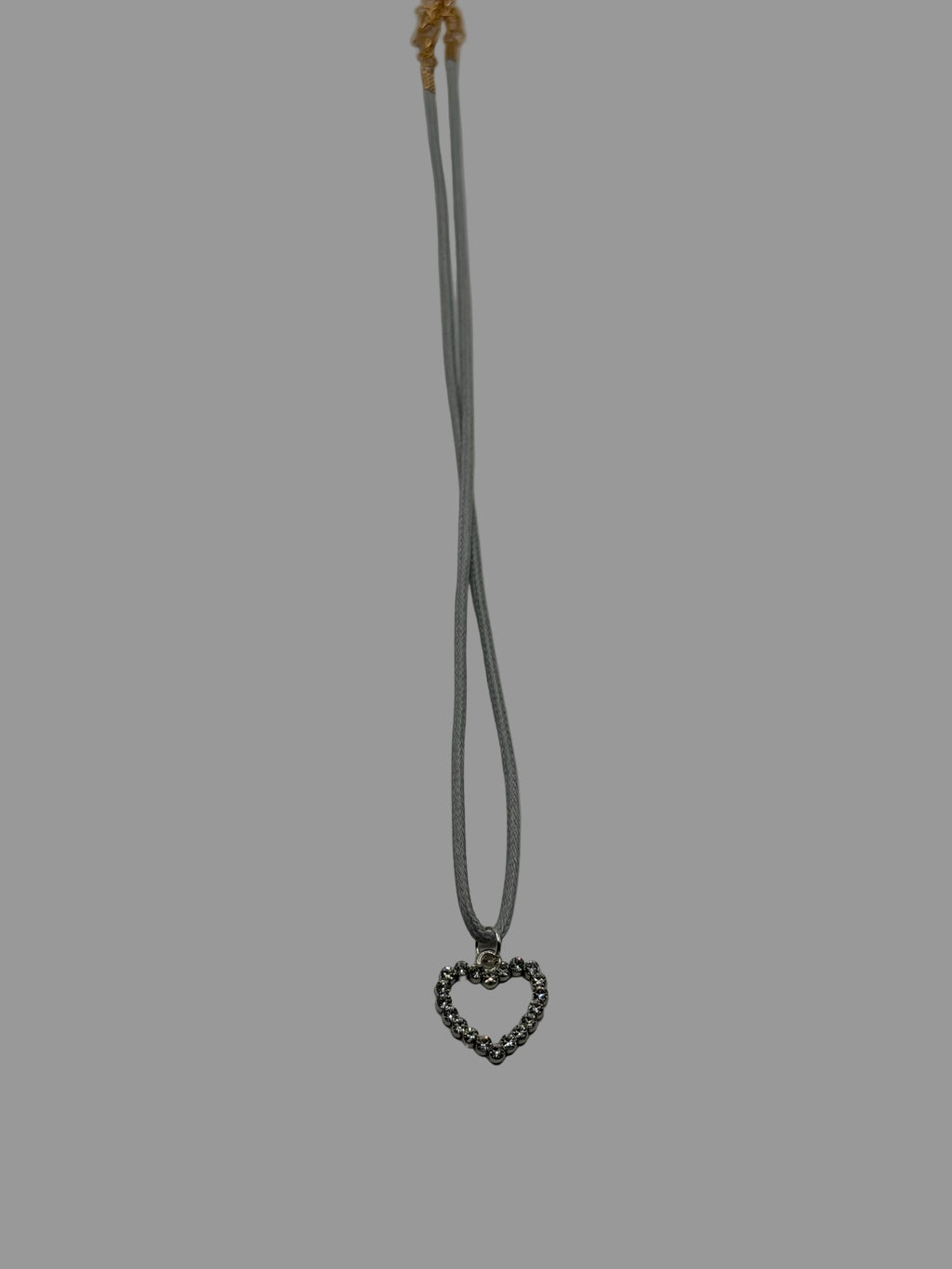 Handmade double gray cord necklace with open rhinestone heart charm and gold lobster clasp