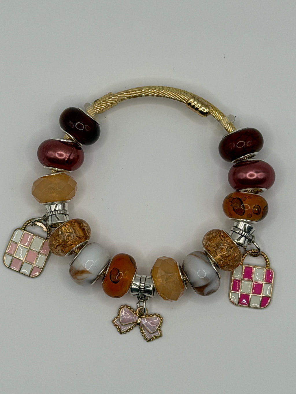 Gold Charm Bangle Bracelet with Brown Beads & Bow Charm
