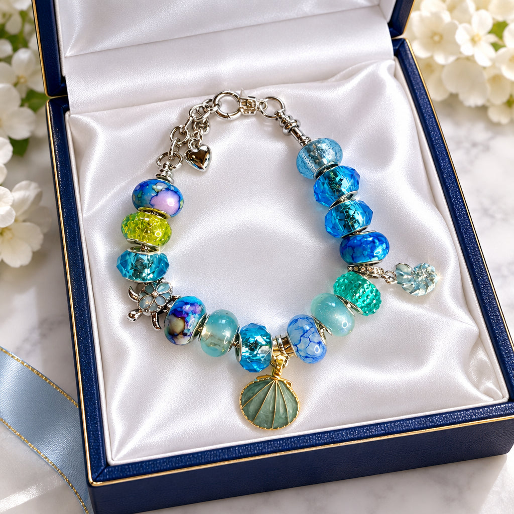 Silver ocean blue shell charm bracelet with sea turtle charm and blue crystal beads