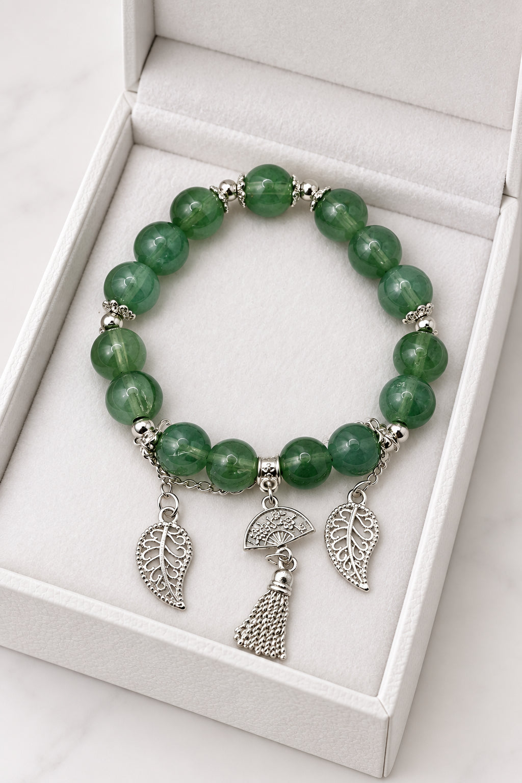 Jade Green Stretch Bracelet with Filigree Leaf, Fan & Tassel Charms