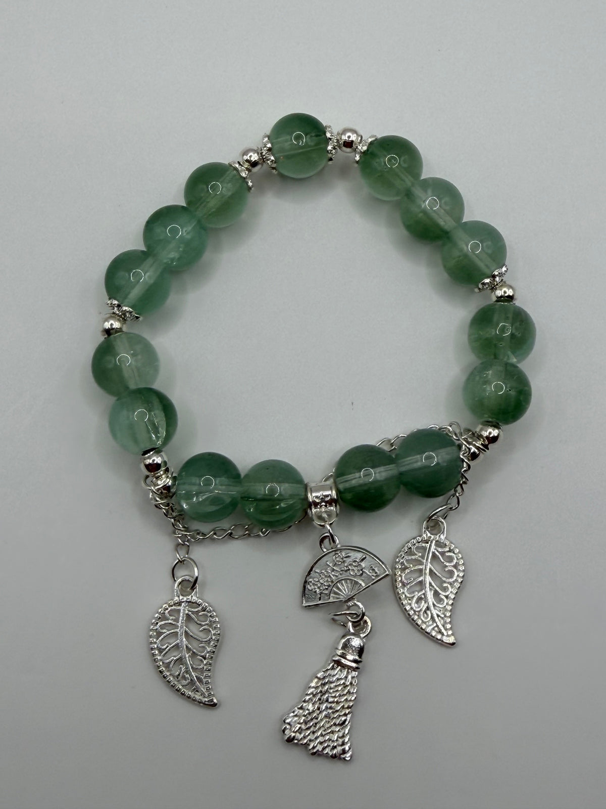 Jade Green Stretch Bracelet with Filigree Leaf, Fan & Tassel Charms