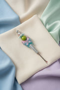 Silver seam ripper with pink and teal butterfly charm and pastel beaded handle